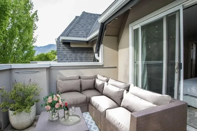 Private patio off of primary bedroom with mountain views